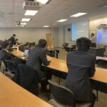 Photo of Silicon Valley Bank representative giving a presentation to FM students.