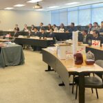 Photo of Wells Fargo representatives giving a presentation to FM students.